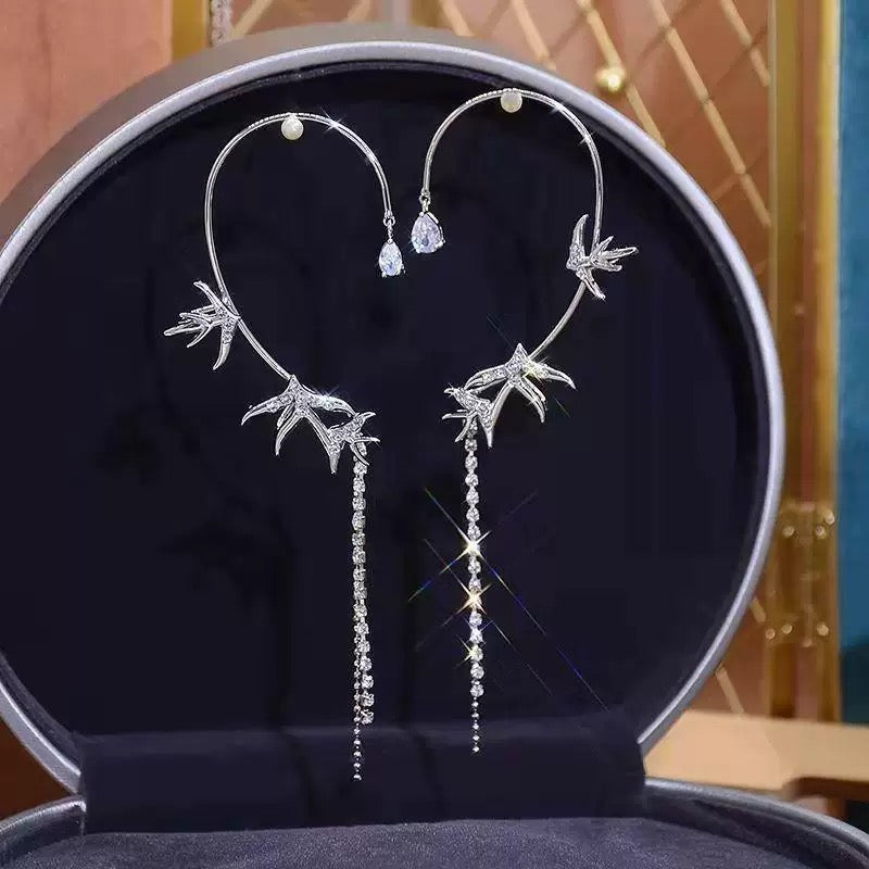 Boucles d'oreilles en forme d'hirondelle étoilée