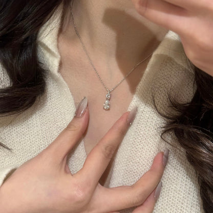 Model wearing Drop Diamond Necklace and Earrings showcasing elegance and sparkle
