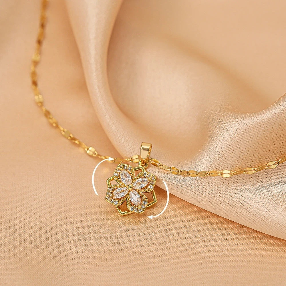 Collana a forma di fiore a quattro petali rotante