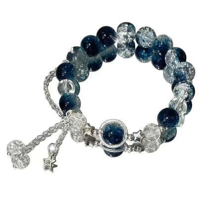 Brilliant Galaxy Bracelet product render showing deep blue glass and crystal beads
