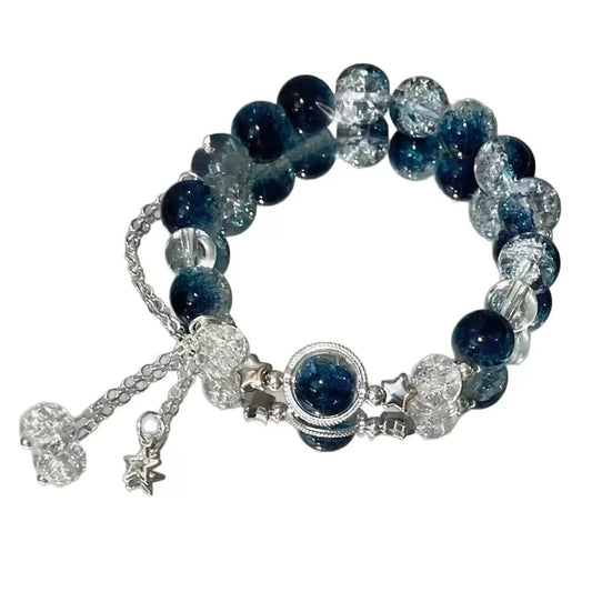 Brilliant Galaxy Bracelet product render showing deep blue glass and crystal beads

