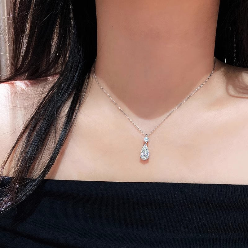 Model wearing Drop Diamond Necklace and Earrings showcasing elegance and sparkle

